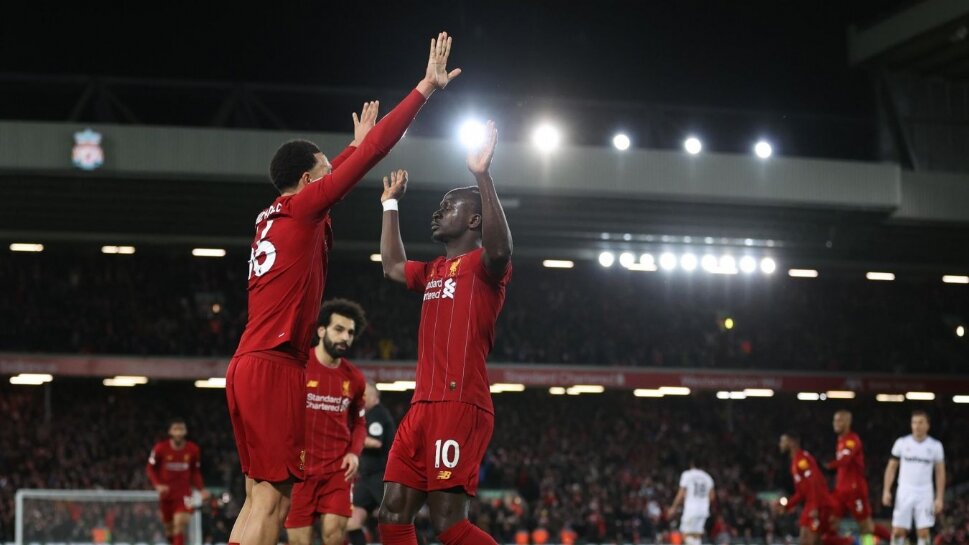 Liverpool on track toward title after wild win