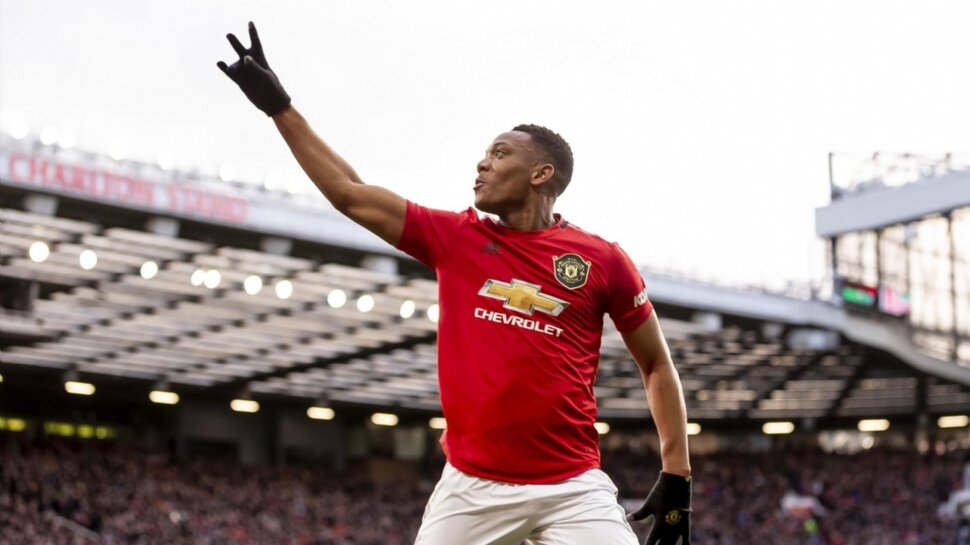 Martial strikes as United clinch double over City