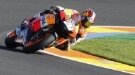 Pedrosa takes pole with lap record